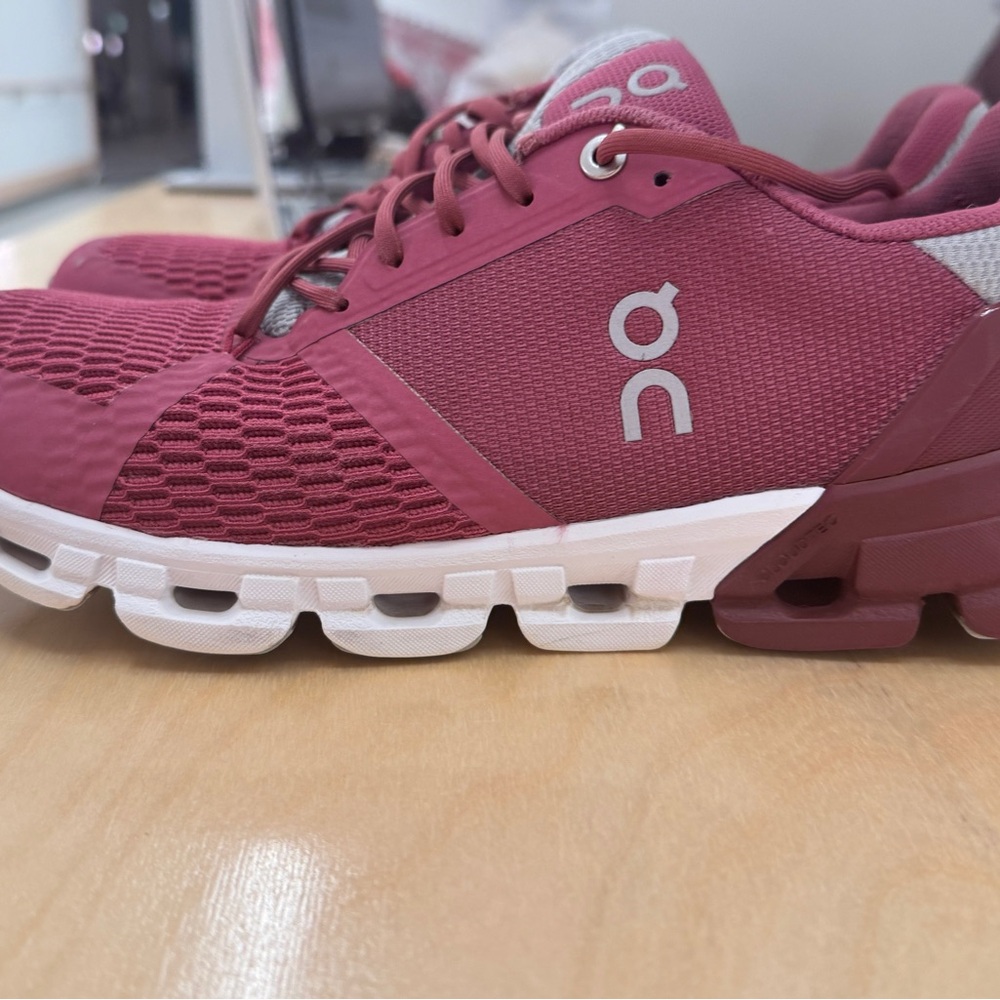 On Running Pink and White Athletic Shoes with Cloud Cushioning